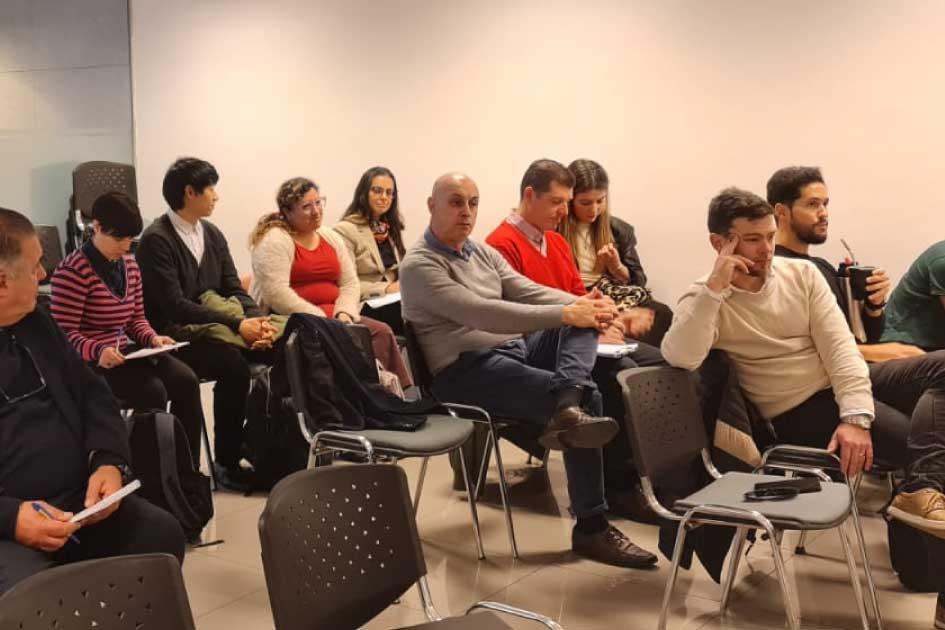 Buenas prácticas para intercambiar expedientes digitales Personas participando del taller sobre buenas prácticas para intercambiar expedientes digitales