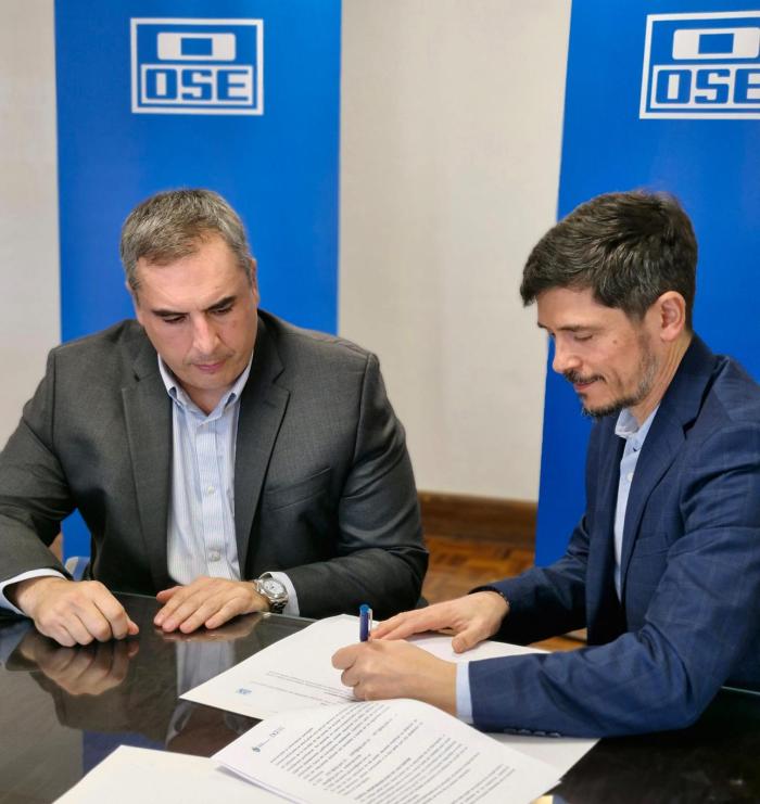 Presidente de OSE Pablo Ferreri y el Director General de la DGI Gustavo González