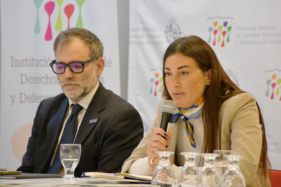 Juan Modelli de ACNUR y Lucila Pizzarulli de OIM
