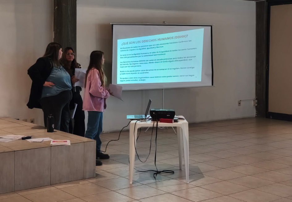  María Belén Florentini, Cándida Caetano y Britney Costa, organizadoras de la actividad