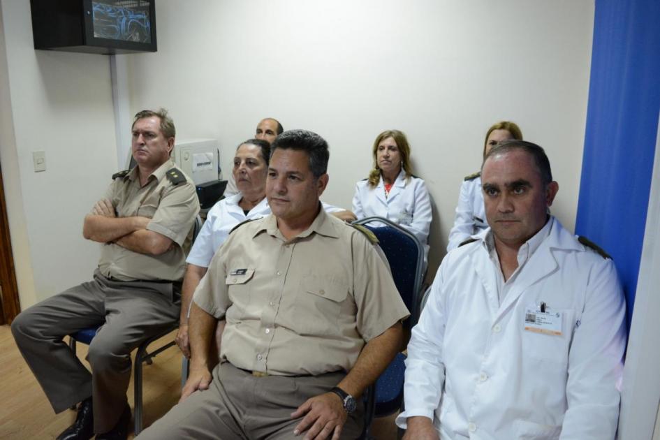 Médicos y autoridades de Sanidad Militar asistiendo a video conferencia Médicos y autoridades de Sanidad Militar asistiendo a video conferencia