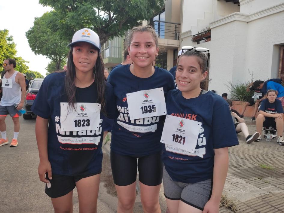 Personas corriendo en INJU 5K Artigas