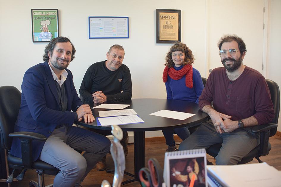 Firma del convenio marco entre UNSAM y DNE. personas sentadas