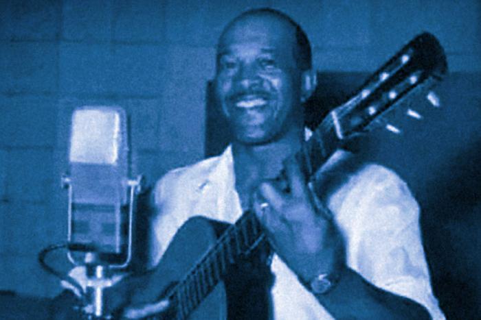 Pedro Ferreira (1910-1980) Persona tocando la guitarra.