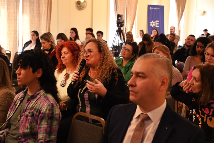 Personas en un auditorio