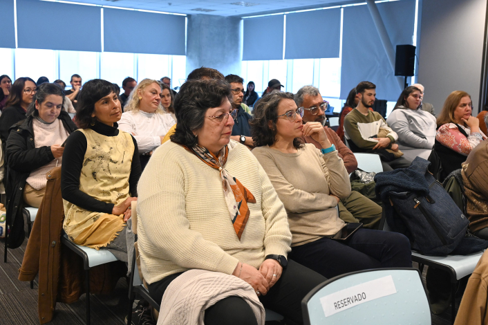 Personas en un auditorio