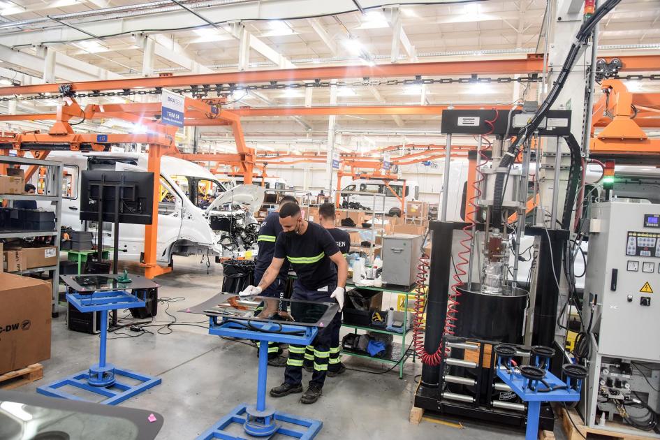 Trabajadores en la fábrica Trabajadores en la fábrica