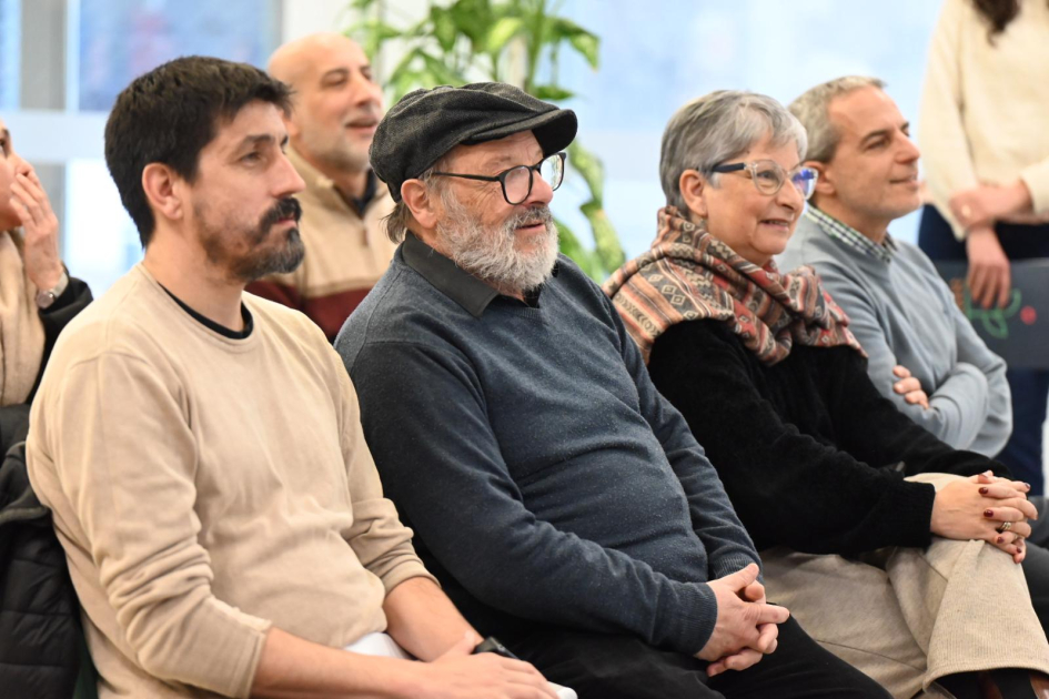 Daniel Olesker y Camilo Álvarez Entre el público, sentados, Daniel Olesker y Camilo Álvarez