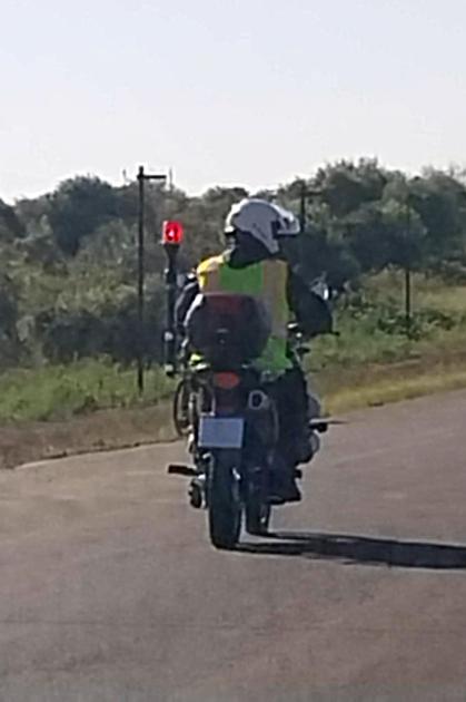 Policía en motocicleta.