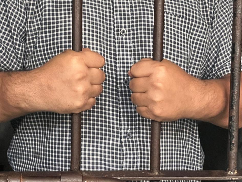 Hombre en prisión. Hombre en prisión.