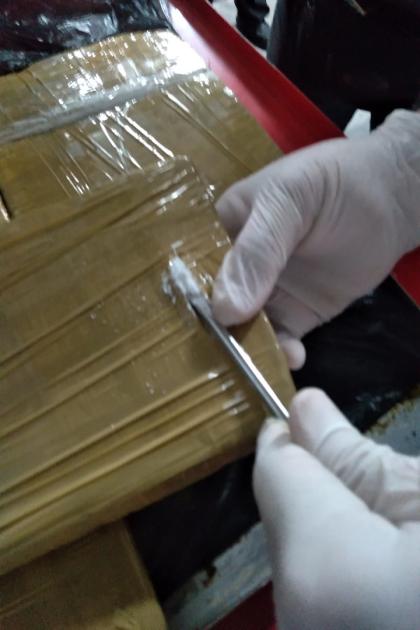 Constatación que los paquetes tenían sustancia blanca Constatación que los paquetes tenían sustancia blanca