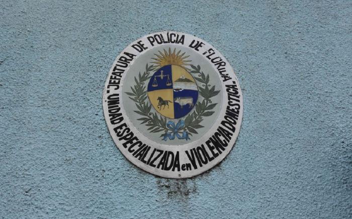 Escudo de la Comisaría Especializada en Violencia Doméstica y Género