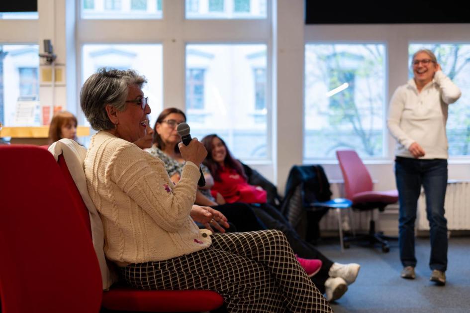 Event about the documentary "The snow between them" Audience members, seated at the event