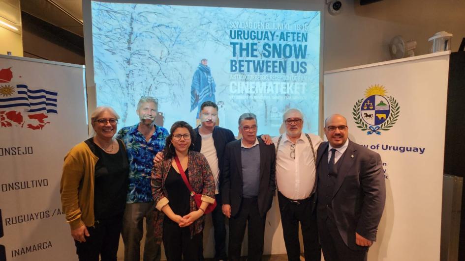 Authorities, production team, and community representatives Authorities, the documentary’s director, and representatives of the community, standing together