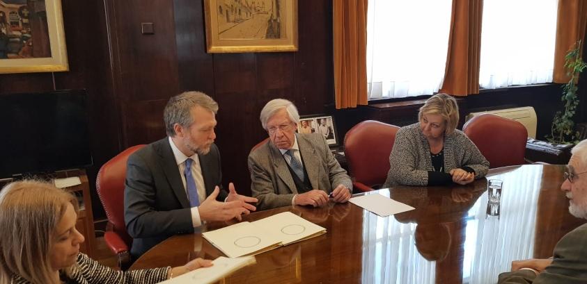 Doyle, Astori, Kechichian y Liberoff durante la firma del acuerdo.