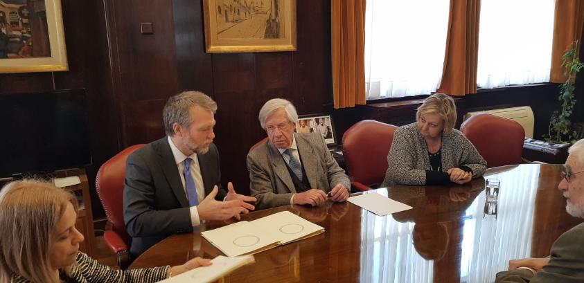 Firma del acuerdo Doyle, Astori, Kechichian y Liberoff durante la firma del acuerdo.
