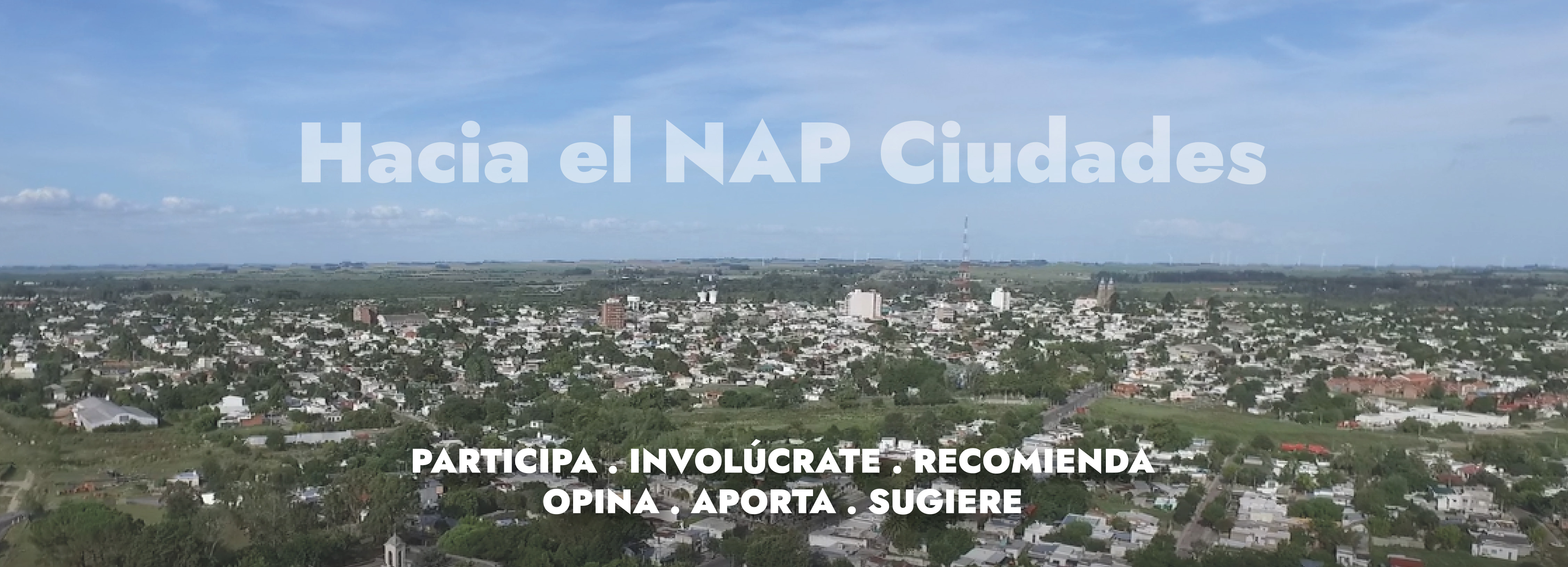 imegen de ciudad que dice Hacia el NAP Ciudades: Participa, Involúcrate, Recomienda, Opina, Aporta, Sugiere 