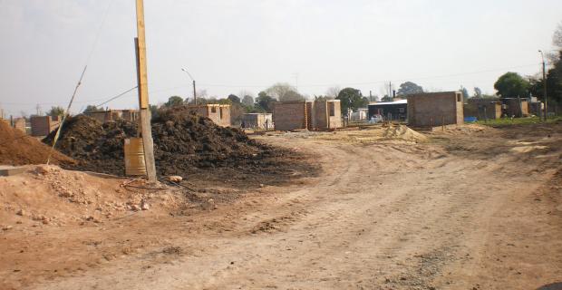 Construcción de viviendas en el Barrio