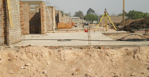 Construcción de viviendas en el Barrio