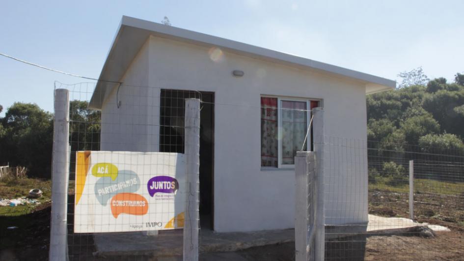 8 familias Fachada de una vivienda