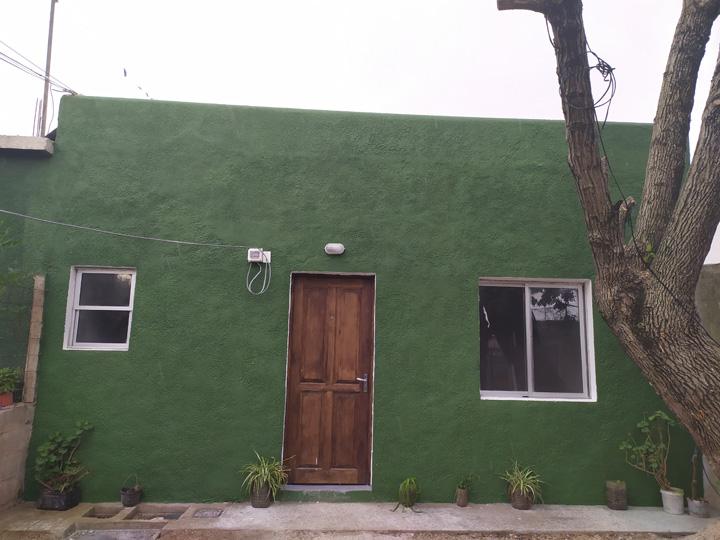Plan Juntos Familia en la puerta de su vivienda Nueva