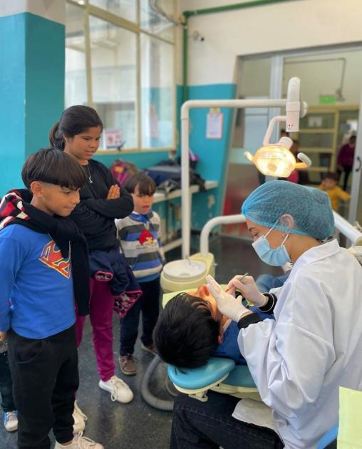 Participantes de Juntos en el consultorio de la Facultad de Odontología