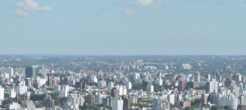 Premio Minurvi Ciudad con edificios y casas, medalla con inscripción Premio Minurvi Mejores Prácticas