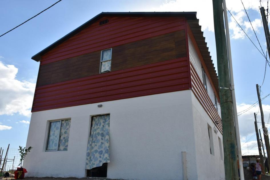 Plan juntos Fachada de una vivienda de 2 plantas