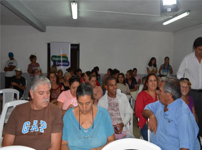 Vecinos en una reunión