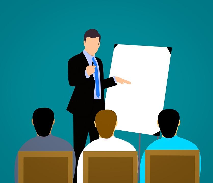 Profesor y alumnos Una persona dando clases