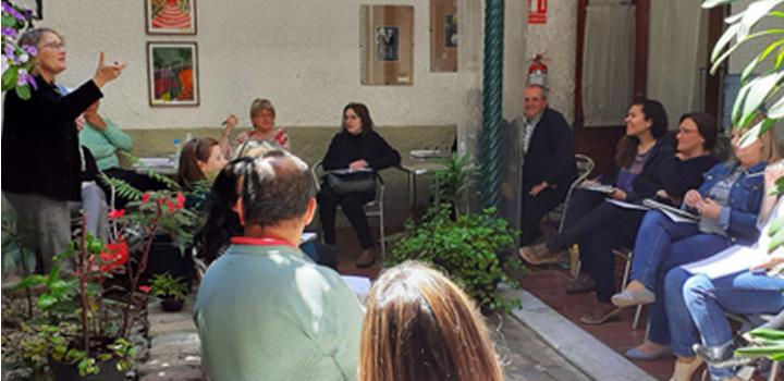 Trabajadores en reunión de trabajo