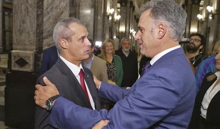 Presidente Yamandú Orsi y José Garchitorena