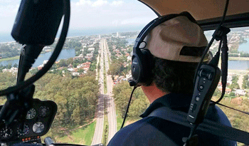 Patrullaje sobre helicóptero de la Policía Patrullaje sobre helicóptero de la Policía