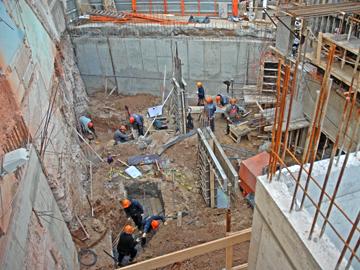 Obreros de la construcción trabajando Obreros de la construcción trabajando
