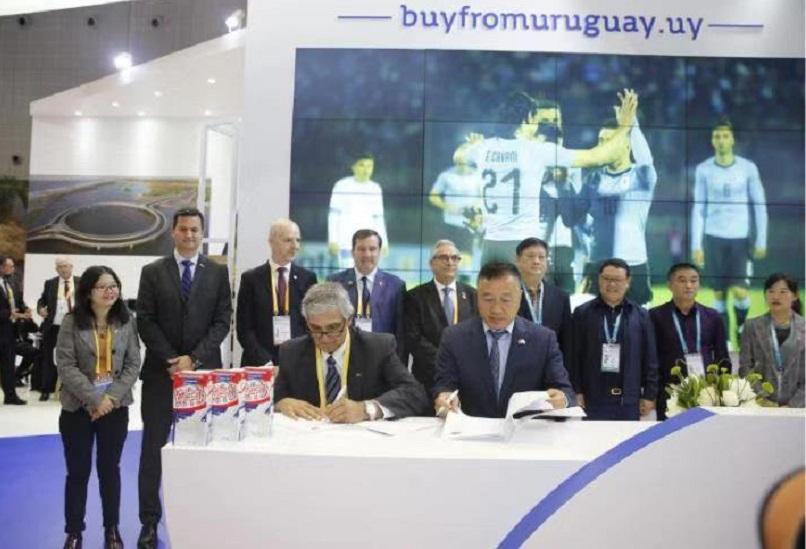 Firma del acuerdo comercial entre Conaprole y empresa láctea china