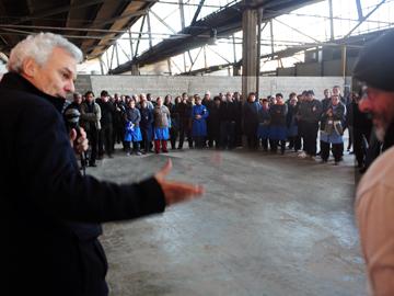 Pedro Buonomo del FONDES y ministro Daniel Olesker en la segunda asamblea anual de la ANERT