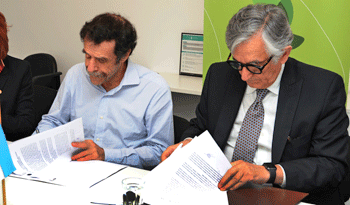 Miguel Brechner y Alberto Rodríguez Saá en firma del convenio