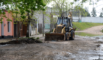 Trabajos de preparación para el retorno a los hogares luego de las inundaciones de 2014, en Durazno. Foto: archivo.