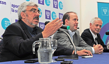 Romani, Trotchansky y Basso en lanzamiento de curso