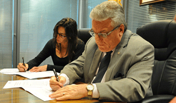 Director de ONSC, Alberto Scavarelli, y la presidenta del Inumet, Madeleine Renom