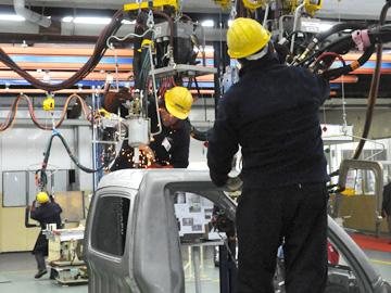 Gente trabajando en fábrica Gente trabajando en fábrica