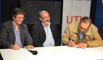 Autoridades en firma de convenio entre UTU y Canal U