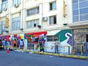 Estudiantes de Escuela Figari de UTU pintan mural en fachada del Ministerio de Trabajo