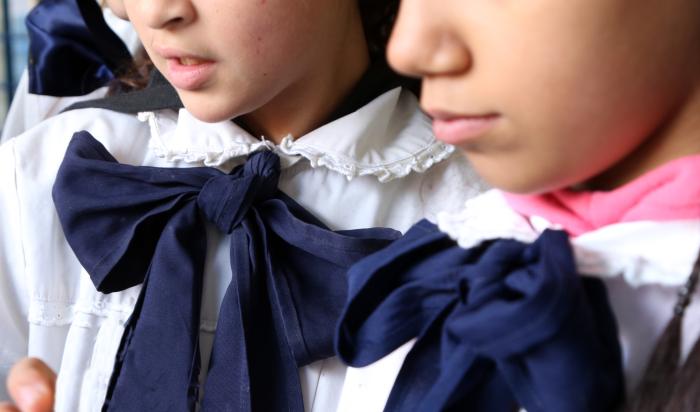 Moñas escolares de niños