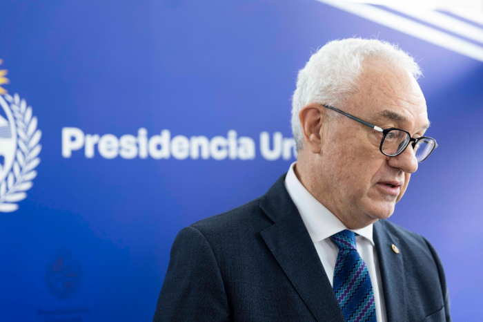Avanza proceso de ratificación plena del acuerdo Mercosur-Unión Europea Canciller Mario Lubetkin frente a un back con el logo de Presidencia de la República
