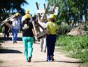 Voluntarios Universitarios de EE.UU.A. en tareas solidarias para obras del Plan Juntos