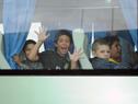 Salida de niños del campamento del Plan Juntos