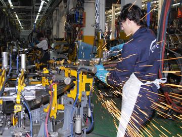 gente trabajando en Industria