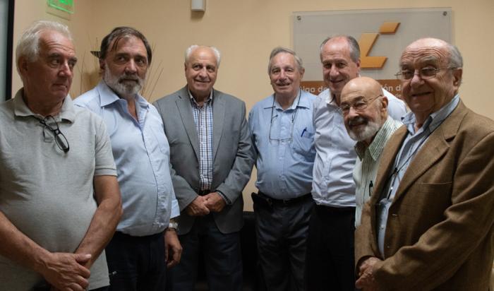 Representantes de la Liga de la Construcción junto a Víctor Rossi, Ernesto Murro y Jorge Mesa