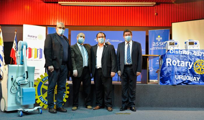 Autoridades de ASSE y Rotary Internacional